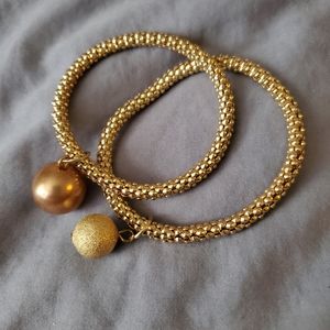 Gold tone bracelets two